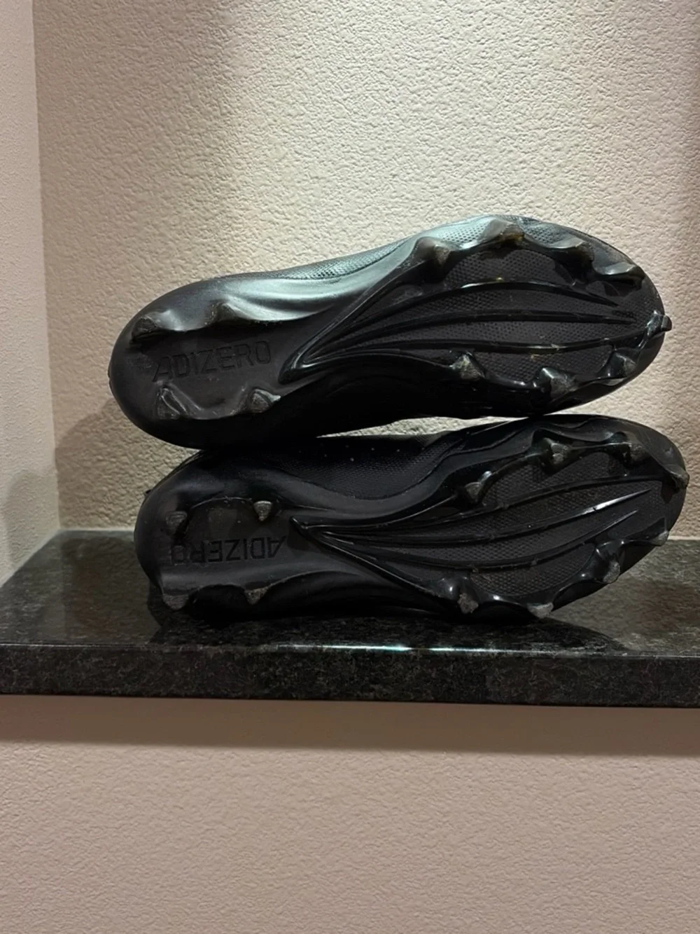 Black Mens Size 11 Football Cleats with White Stripes